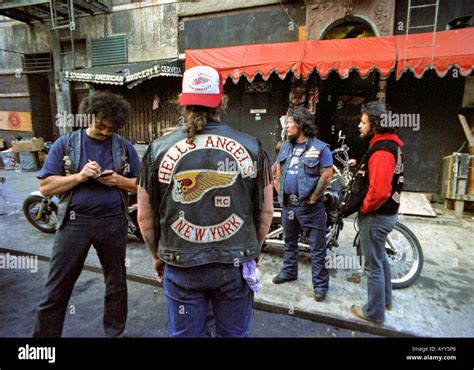 Boucher (2nd left), is greeted by other club members at a boxing match in Montreal in this 1998 file photo. . Hells angels westchester ny